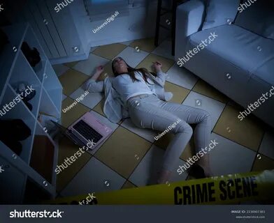 young woman lying dead on the floor after rape - crime scene. 