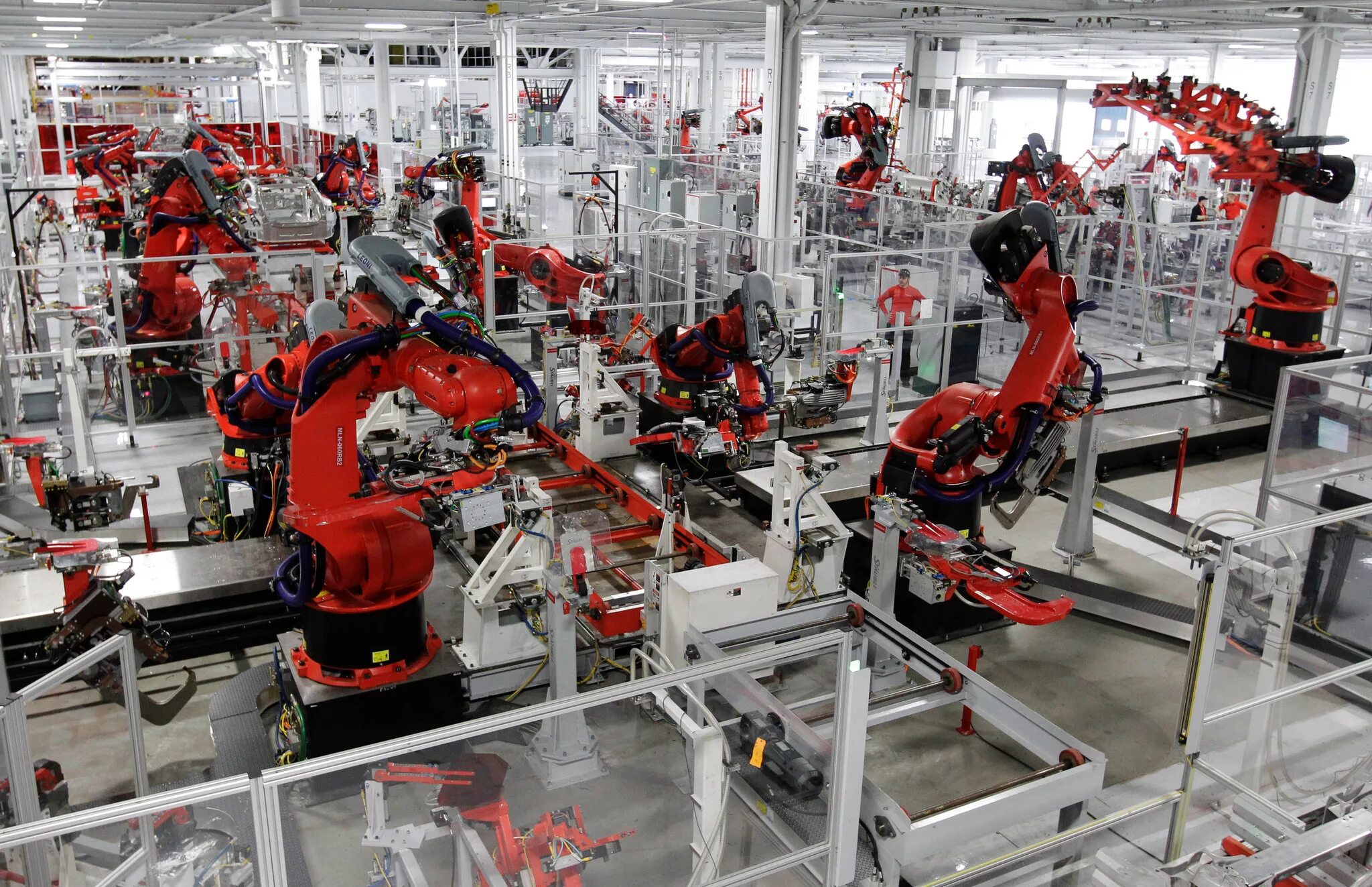 Промышленные роботы. Фабрика роботов. Роботы для автоматизации производства. Промышленный робот на заводе.