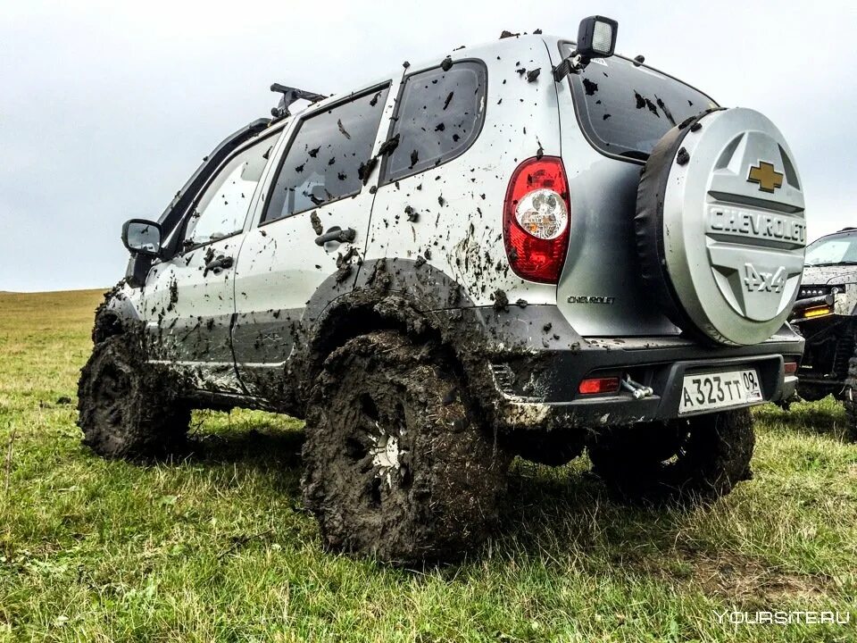 Тюнинг шевроле нива купить. Нива Шевроле оффроад. Niva Chevrolet Offroad Tuning. Chevrolet Niva внедорожный. Off Road тюнинг Нива Шевроле.