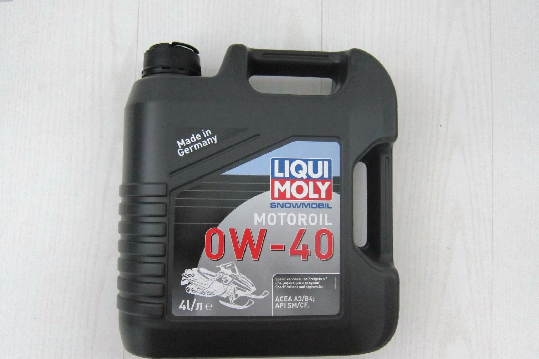 Масло для снегоходов цена. Ликви моли 0w40 4т для снегохода. Snowmobil Motoroil 0w-40. Liqui Moly 0w30 c2. Масло для снегохода 4т 0w40.