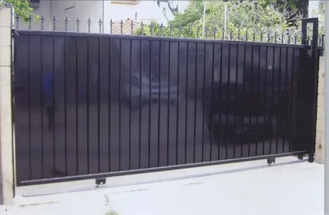 Откатные ворота на рельсе