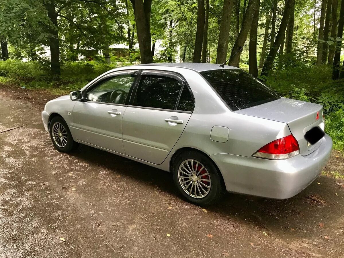 Lancer 9 кузов. Митсубиси Лансер 2003. Mitsubishi Lancer IX 2003. Mitsubishi Lancer IX 2003-2007. Лансер 2003 автомат 2.3.