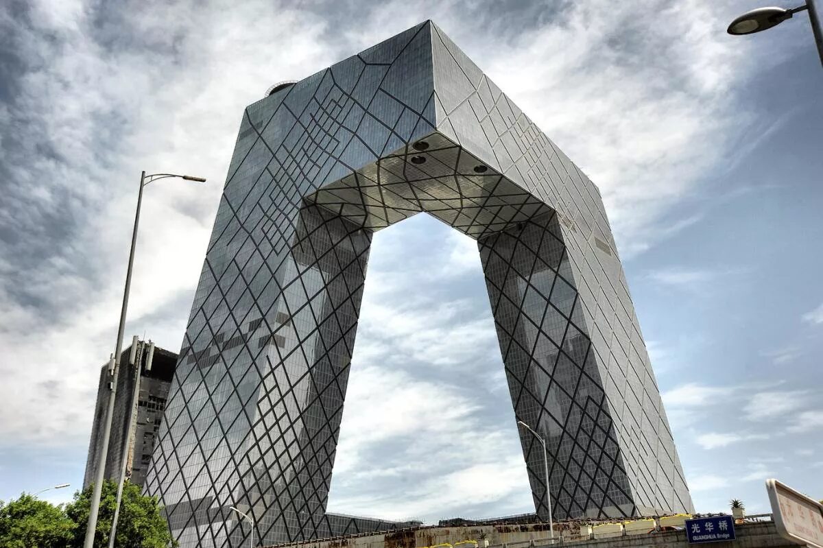 Здания в виде букв. Буквы в виде архитектурных сооружений. Буква а в виде домика. Буквы на здании. Необычные архитектурные сооружения.