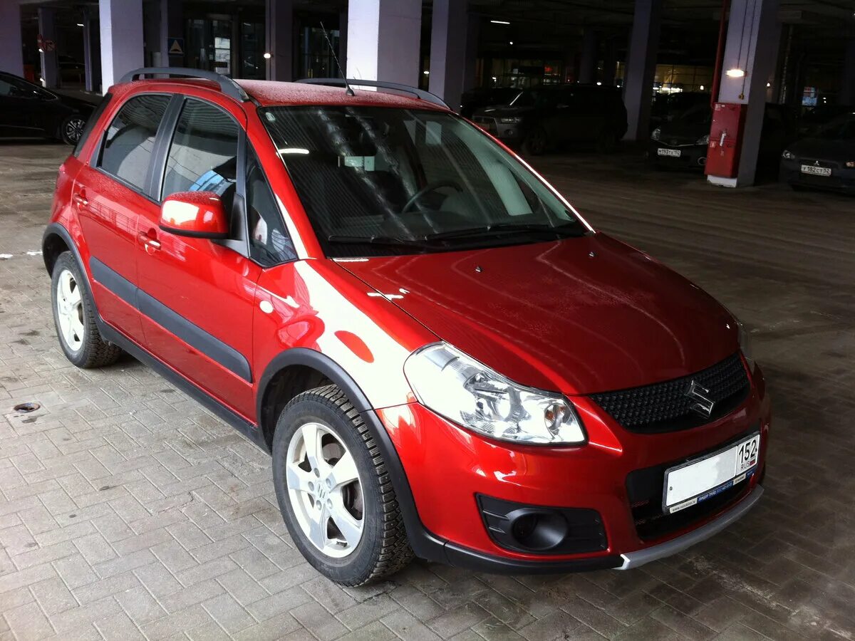 Сузуки сх4 2012. Сузуки sx4 2012. Судзуки сх4 красная. Сузуки сх4 красная 2012.