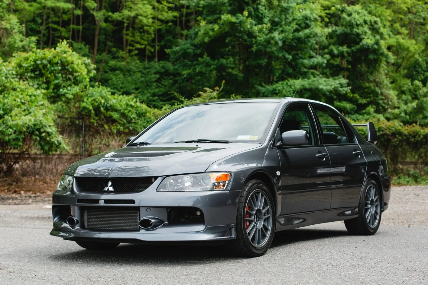 Evo tl. Митсубиси Лансер Эволюшн. Lancer EVO 9. Mitsubishi Lancer Evolution IX. Митсубиши Лансер 9 Эво.