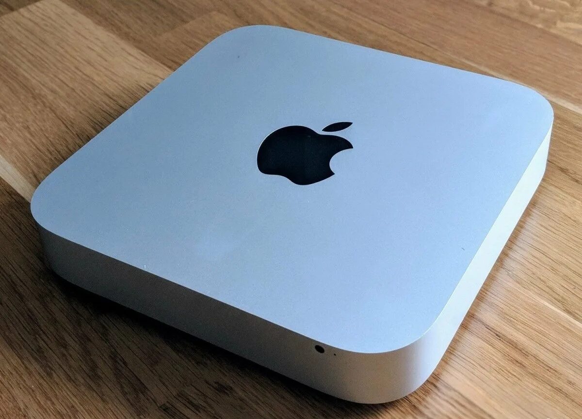 Апле мини. Apple Mac Mini. Компы эпл маленький. Стол для мас мини. Lujo Apple Mini.