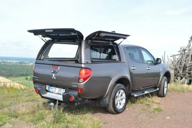 Купить кунг митсубиси. Mitsubishi l200 кунг. Кунг Митсубиси л200. Кунг для Мицубиси л200. Митсубиси l200 с кунгом.