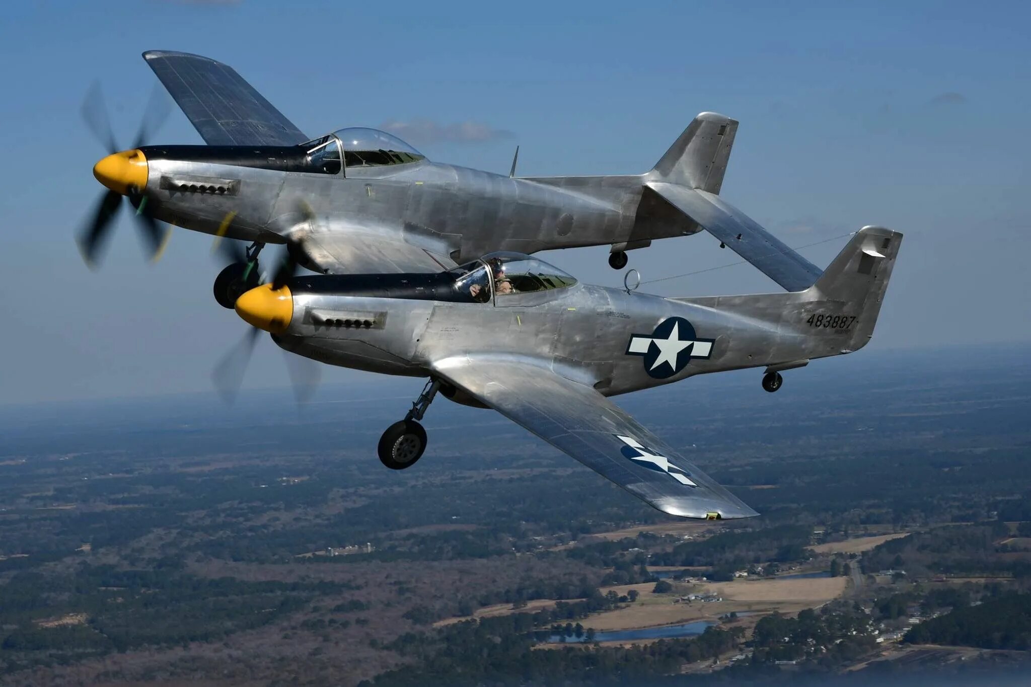 She flies planes. XP-82 Twin Mustang. North American f-82 Twin Mustang. North American p-82 Twin Mustang. P 51 Twin Mustang.