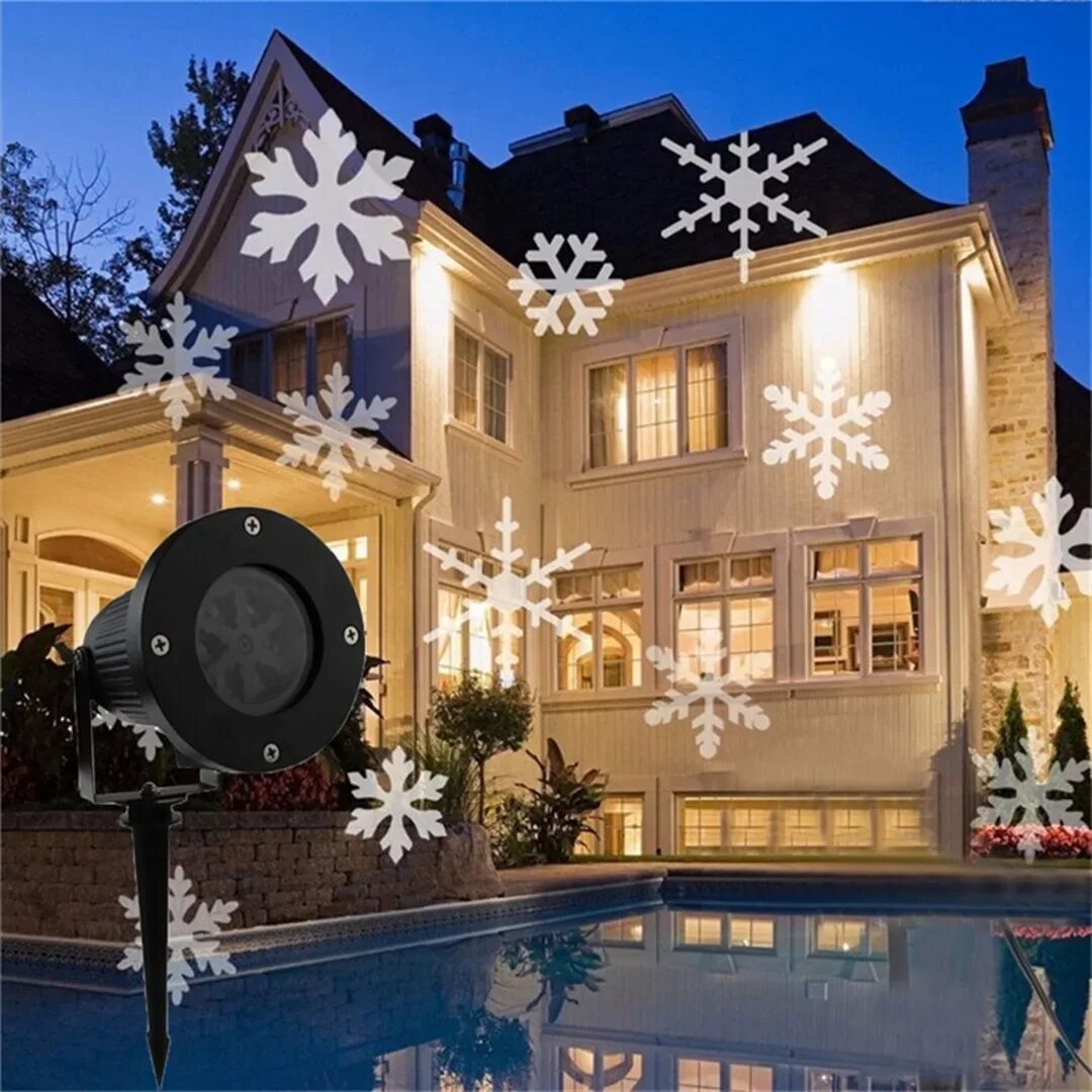 Лучший новогодний проектор. Лазерный проектор snowflake light. лазерный проектор снежинки. прожектор новогодний для улицы. лазерный проектор снежинки для улицы.