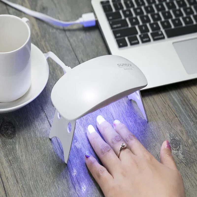 Что делает лампа для ногтей. SUNUV SUNMINI 6 Вт UV led. SUNUV лампа для ногтей. UV led Nail Lamp. Мини-лампа Nail Lamp q3 (6 Вт).