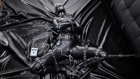 Tagged with: bondage, gagged, straitjacket & electrical play. 