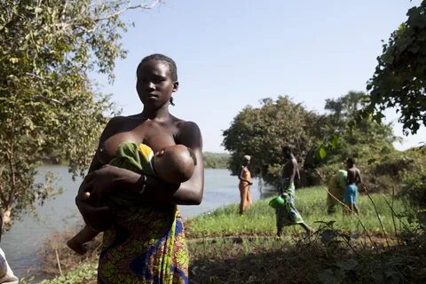 Completely naked african village ladies image.