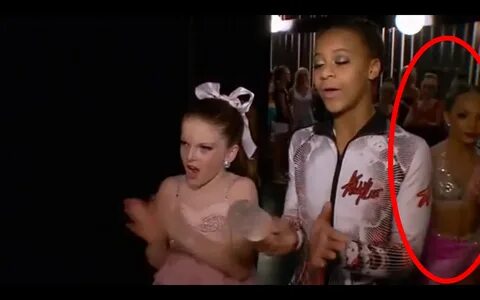 After Mackenzie finished dancing, Tea and Nia were cheering in the wings......