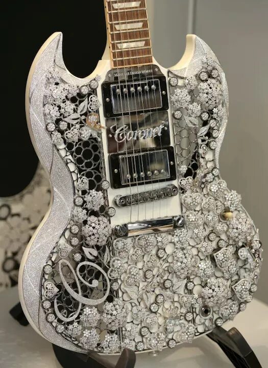 The most expensive production guitar model to date is the Fender Midnight Opulen