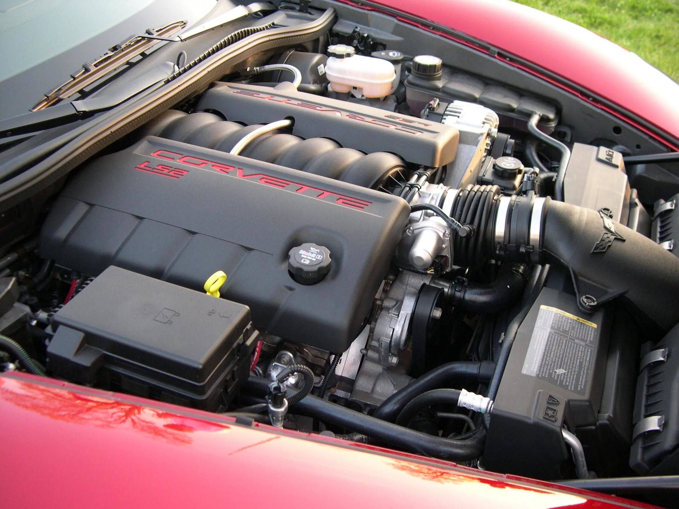 Лс 1 лс 2. Мотор GM ls3. Corvette c6 v8. Chevrolet Corvette 7.0 двигатель. Шевроле Корвет 2005 мотор.