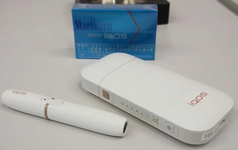 нагреватель табака айкос. система для курения айкос стиков. прибор для стиков сигарет. курит электронные сигареты айкос. система нагревания табака lil.