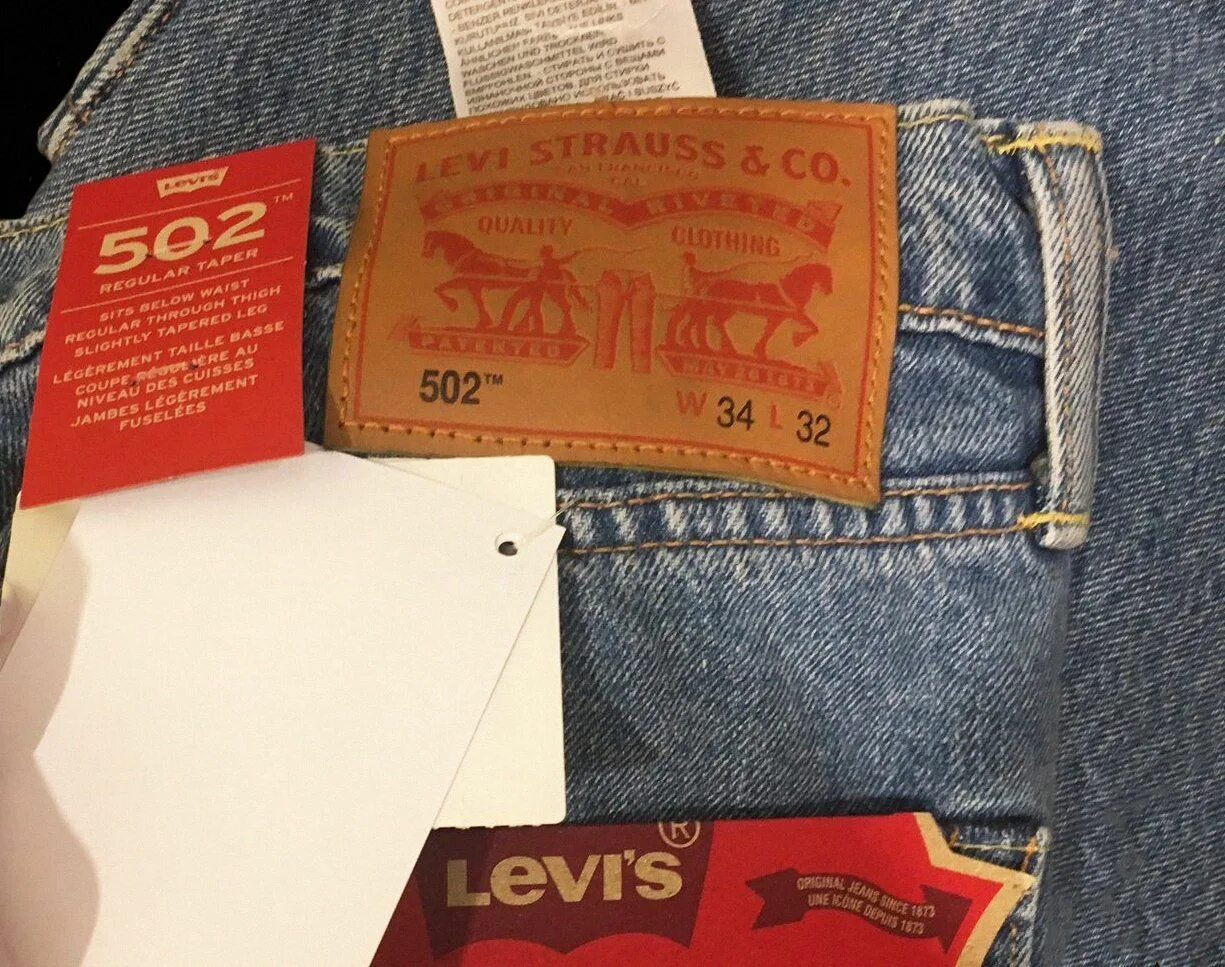 Как отличить levis. Штаны левайс бирка. Джинсы левайс 502 мужские оригинал. Levis 501 бирка. Бирки Левис Original Jeans.