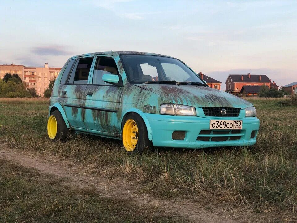 Mazda Demio 1998. Mazda Demio 1. Мазда Демио 1999. Мазда Демио 1999 stance.