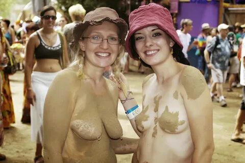 Oregon county fair topless. , A woman wearing body paint dances at the 48th...