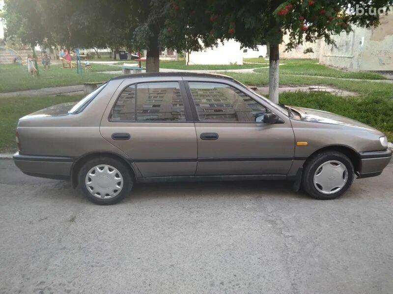 Ниссан санни годы выпуска. Nissan Sunny 1991 n14. Nissan Sunny 1990 n14. Ниссан Санни n14. Ниссан Санни 1.6 n 14 1991.