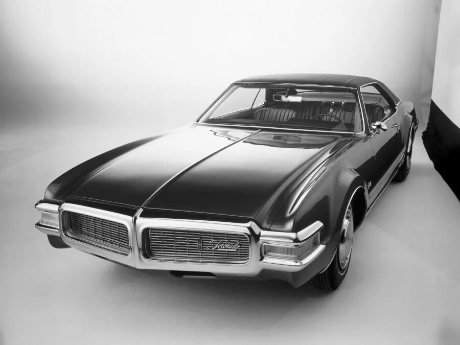 Олдсмобиль 1969. Oldsmobile Toronado 1969. Олдсмобиль Торнадо 1969. Олдсмобиль Торнадо 1966. Oldsmobile toronado