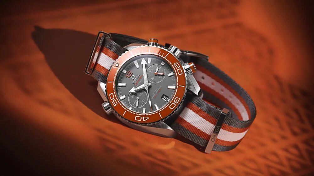 Омега 1 купить. Omega Seamaster Planet Ocean Orange. Omega Seamaster Planet Ocean. Часы Omega Seamaster Planet Ocean 007. Omega Seamaster рыжие.