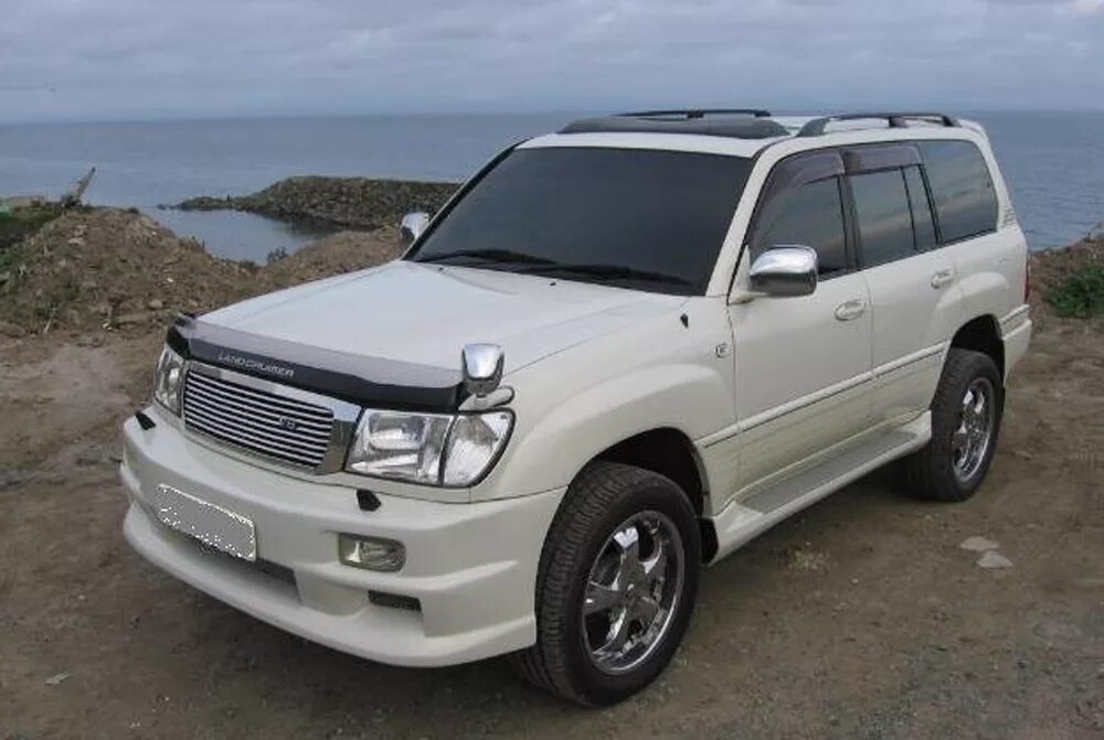 Toyota Land Cruiser 100 White. Тойота ленд Крузер 100 обвес. Land Cruiser 100 белый. Toyota Land Cruiser 100 Tuning.