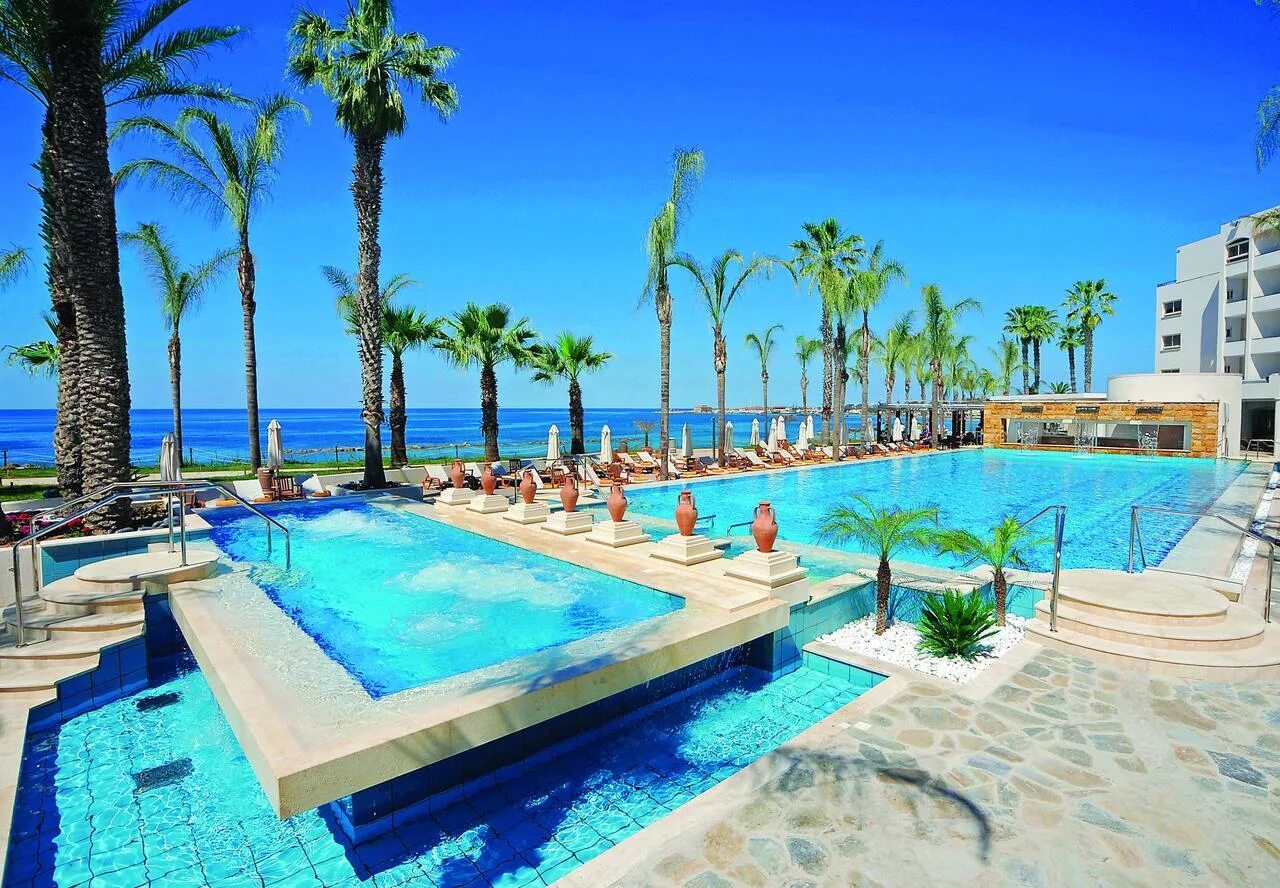 Amathus beach hotel limassol 5 кипр. Athena hotel paphos. Okeanos beach boutique hotel 4*. Отели кипра первая линия. Медитерраниан лимассол.