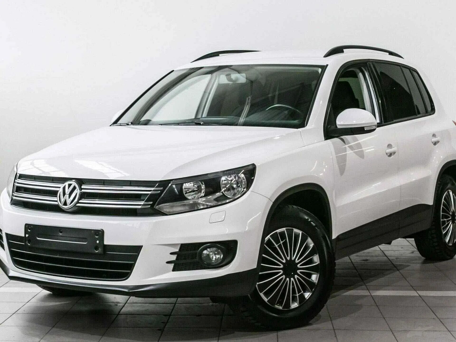 Volkswagen tiguan годы выпуска. VW Tiguan 2013. Фольксваген Тигуан 2013. Тигуан Фольксваген 2013г. Фольксваген Тигуан 2013 белый.