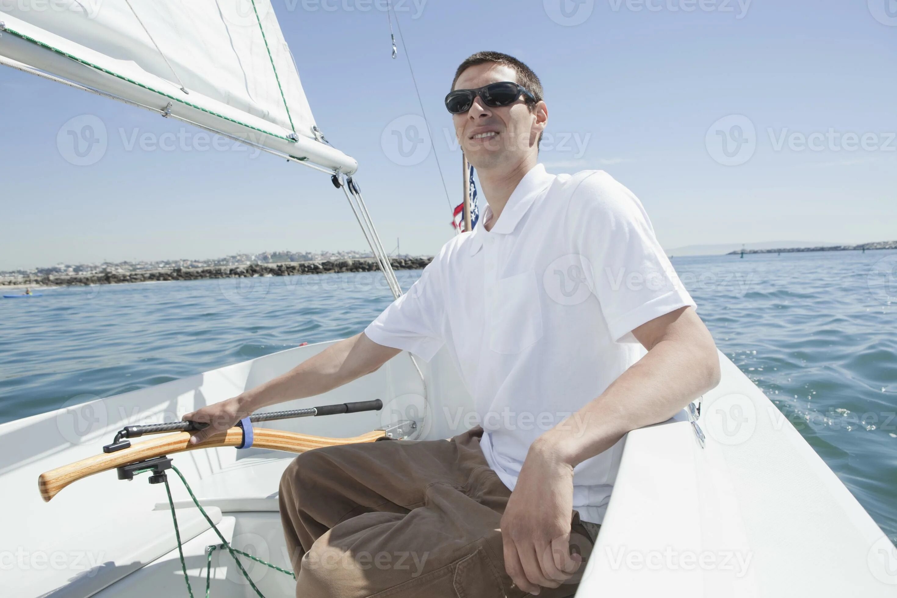 Sailing man. Лысый мужчина на яхте. Sailing man. Человек на паруснике. Sailing man.