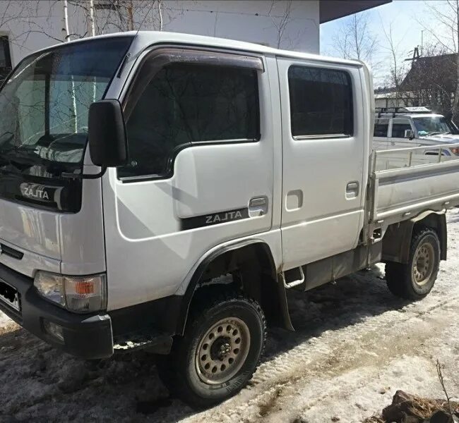 Ниссан атлас двухкабинник 4вд. Nissan Atlas 4wd двухкабинник. Ниссан атлас 4 ВД. Ниссан атлас 150 двухкабинник. Купить ниссан атлас в хабаровске