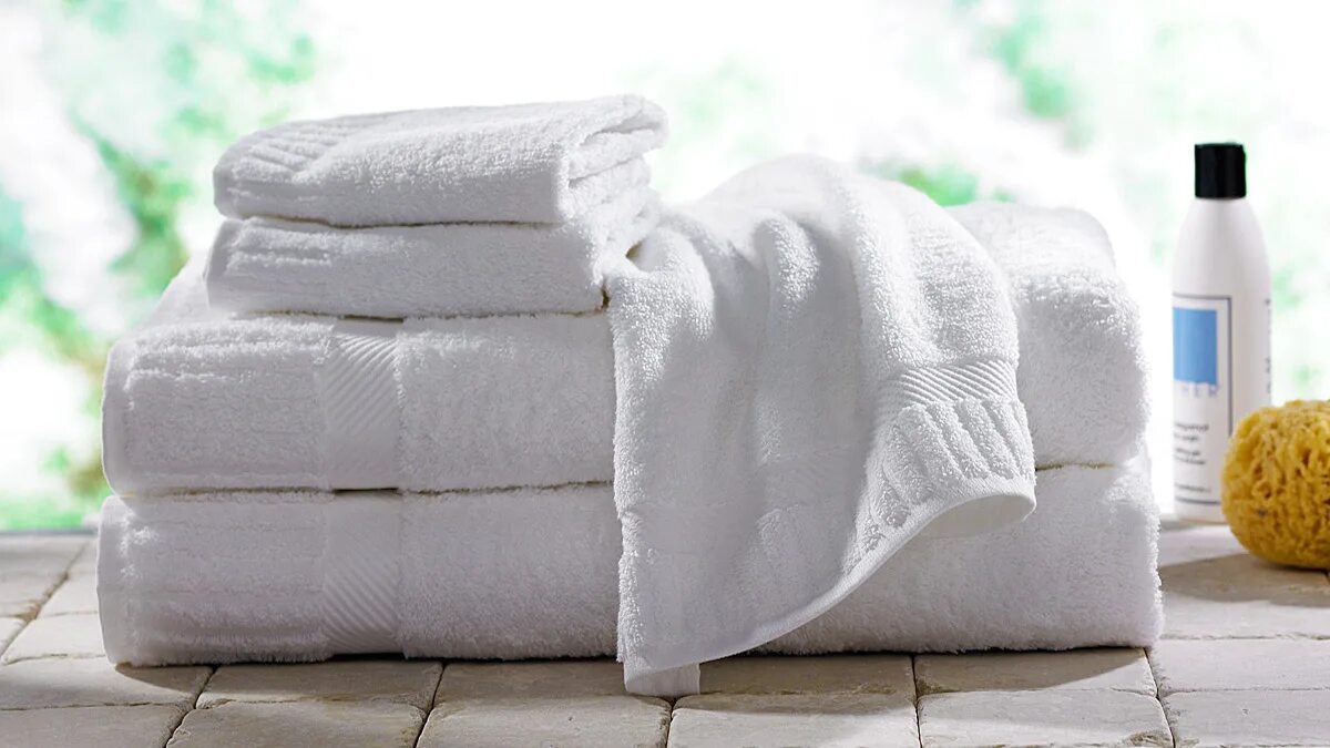 Быстро отбелить полотенца в домашних условиях. Белое полотенце. Белоснежные полотенца. Белые вещи. Полотенце Bath Towel.