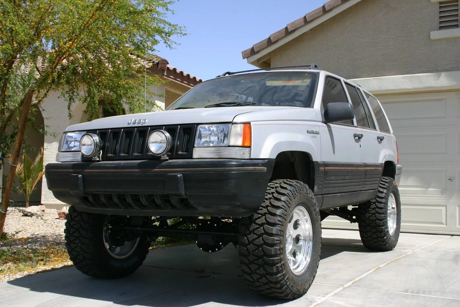 Jeep zj. Jeep Grand Cherokee ZJ 1994. Jeep Grand Cherokee ZJ. Джип Cherokee 1994. Jeep Grand Cherokee ZJ Laredo.