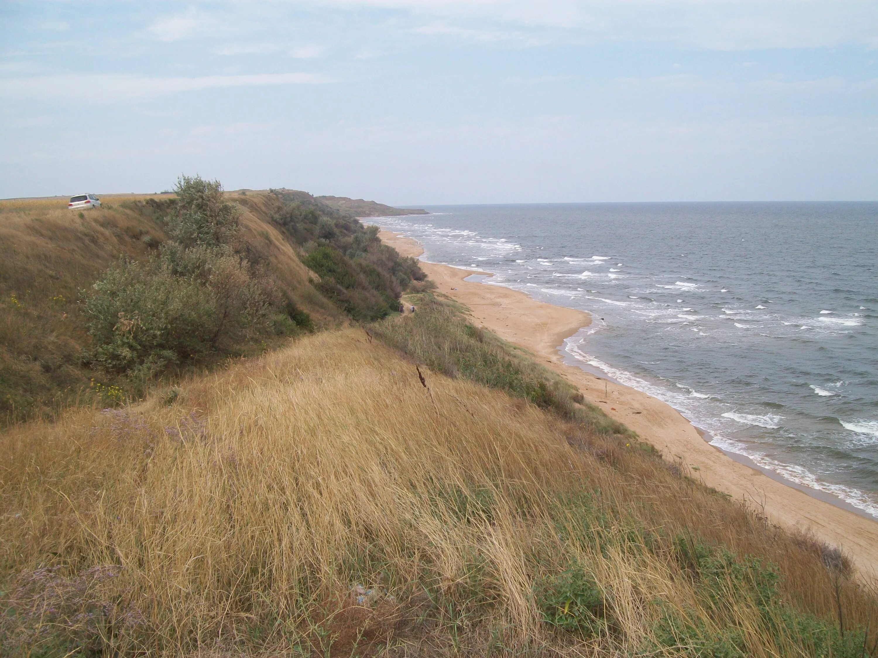 Поселок кучугуры на азовском море. Посёлок кучугуры краснодарский край. Фото кучугуры краснодарский край поселка и пляжа. Поселок кучугуры на азовском море. Поселок кучугуры море.