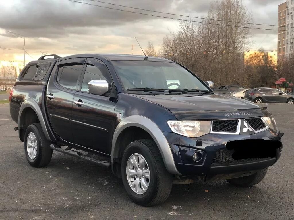 Мицубиси л200 с пробегом. Mitsubishi l200. Мицубиси л200. Митсубиси л200 2011. Mitsubishi l200 2011 г.