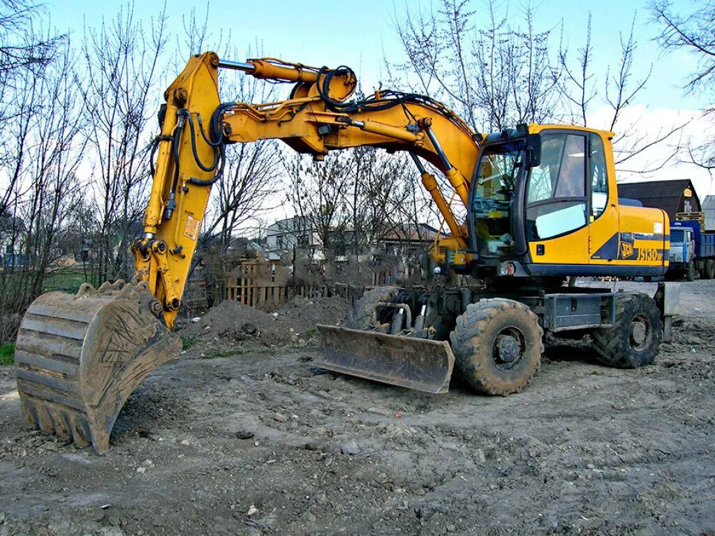 Куплю б у полноповоротный. Экскаватор колесный JCB 130. JCB js 130w. JCB 130 колесный. Полноповоротный экскаватор js 130w.