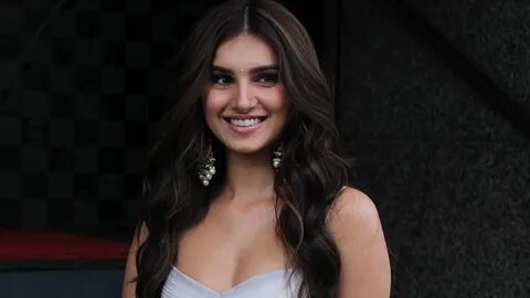 Tara Sutaria wore her white Gaurav Gupta lehenga with statement.