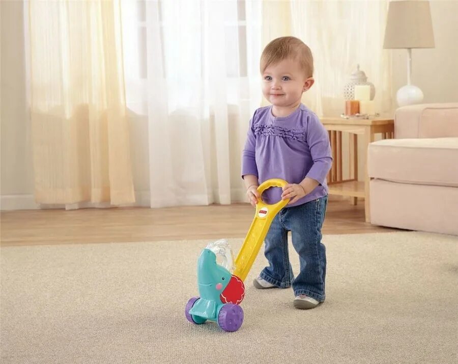 Включи дети ходят. Слон каталка Fisher Price. Малыш с каталкой. Игрушка первые шаги. Игрушка для малышей с каталкой.