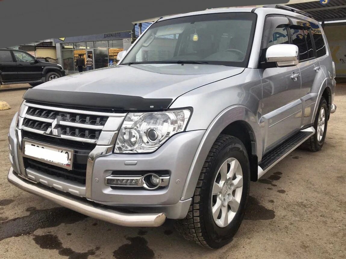 Mitsubishi pajero 2015. Митсубиси Паджеро 2015. Mitsubishi Pajero IV 2015. Mitsubishi Pajero IV Рестайлинг 2. Мицубиси Паджеро 2015г.