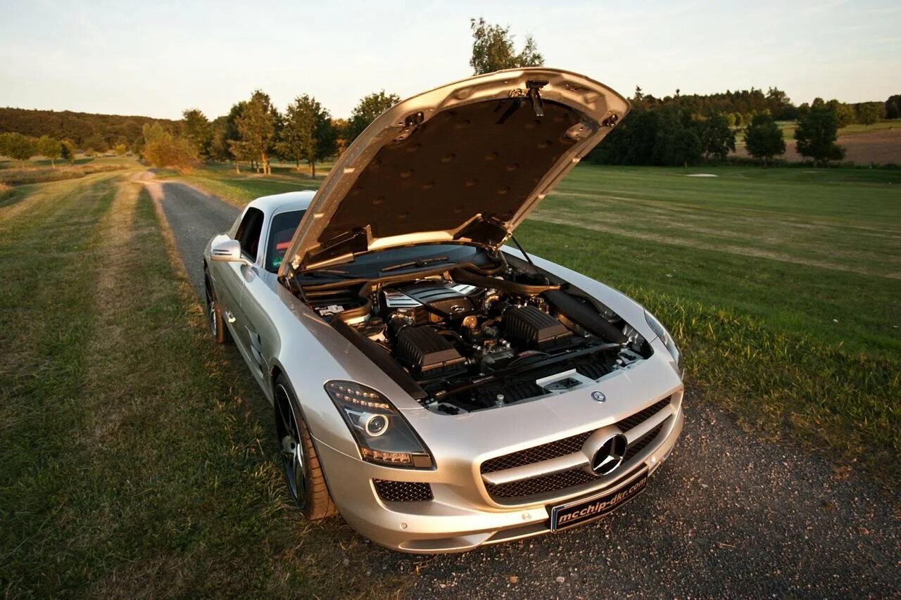 Продвинутые машины. Mercedes Benz SLS AMG mc700. Двигатель Мерседес СЛС 63 АМГ. Mercedes Benz SLS 2007. 2012 Mercedes SLS AMG.