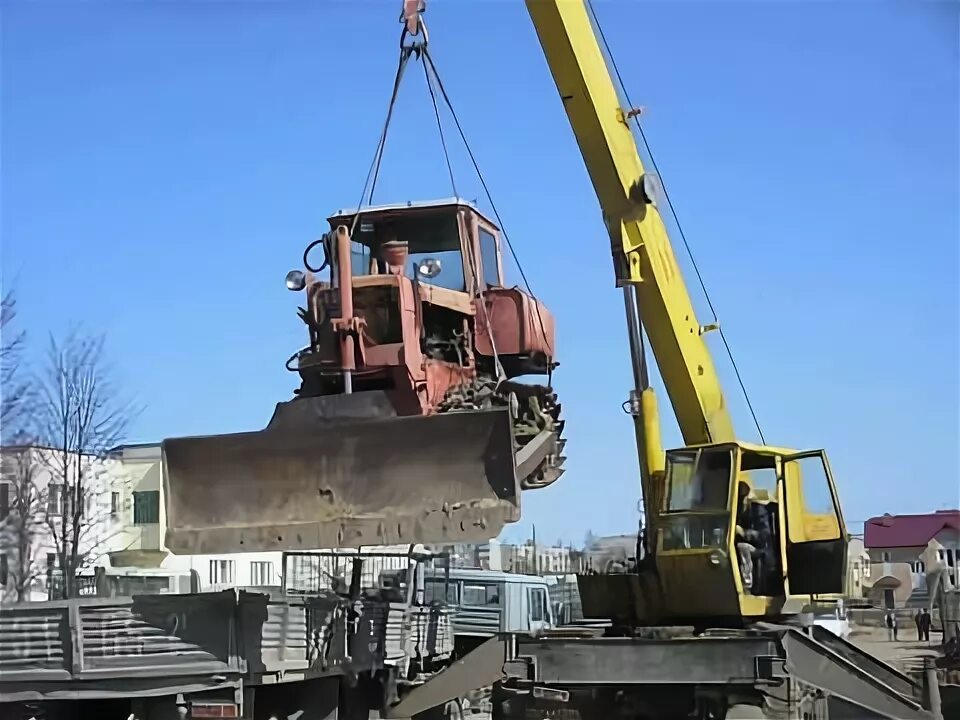 Подъем тракторов. Дт 75 с краном. погрузка дт 75 краном. подъемный кран на базе дт-75. трактор дт-75 подъёмный кран.
