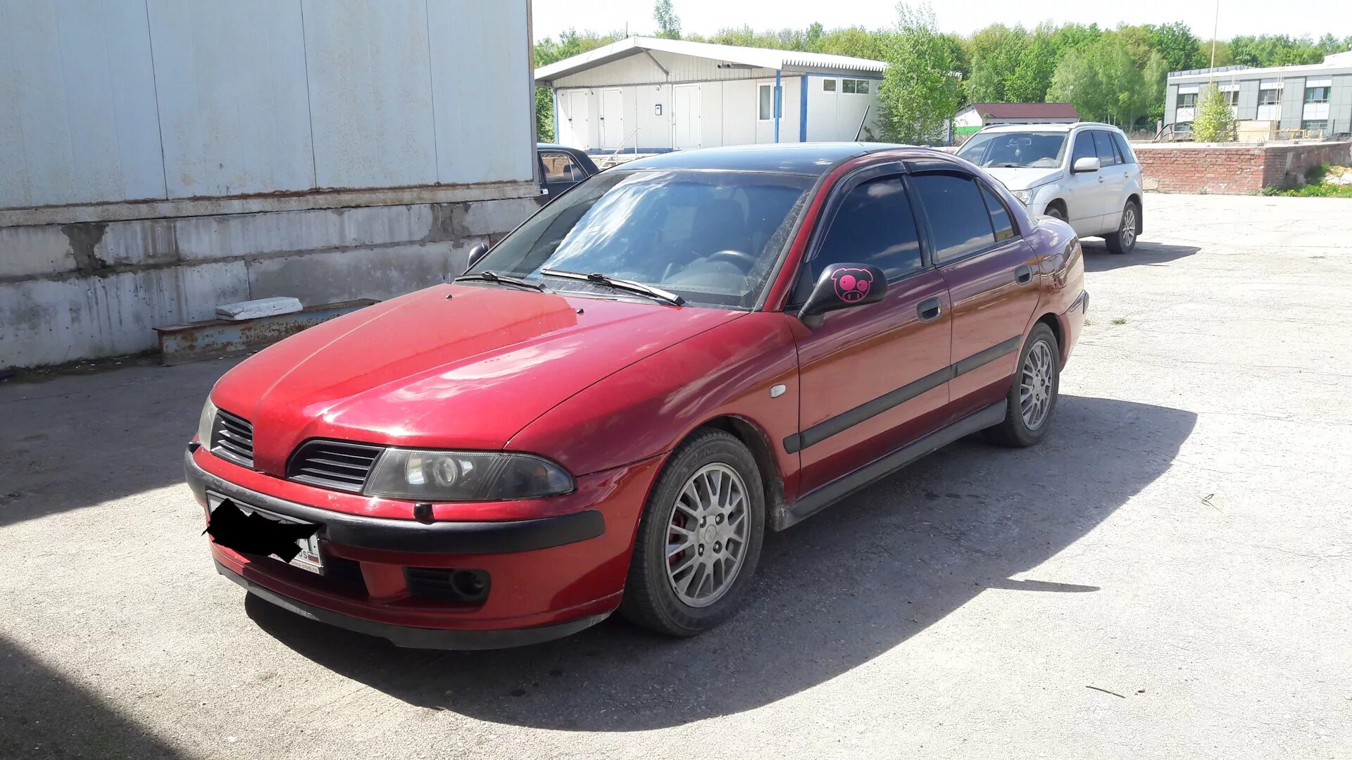 Купить митсубиси в туле. Mitsubishi Carisma 2003 красная. Митсубиси Каризма 2003. Митсубиси харизма 1.8 2001. Мицубиси Каризма 2002.