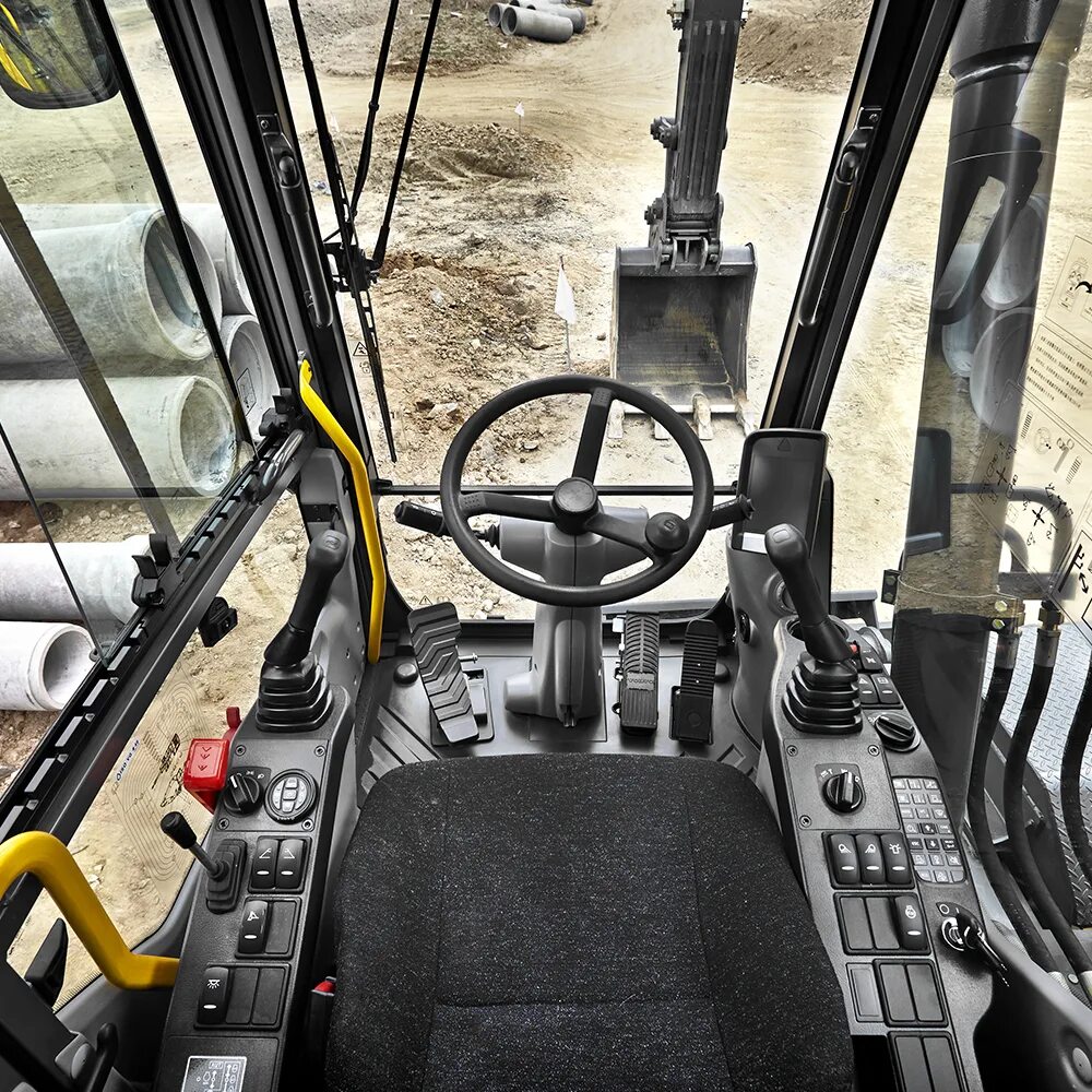 Volvo ew205d. Колесный экскаватор Volvo ew205d. JCB 205 экскаватор кабина. Экскаватор Вольво 205.