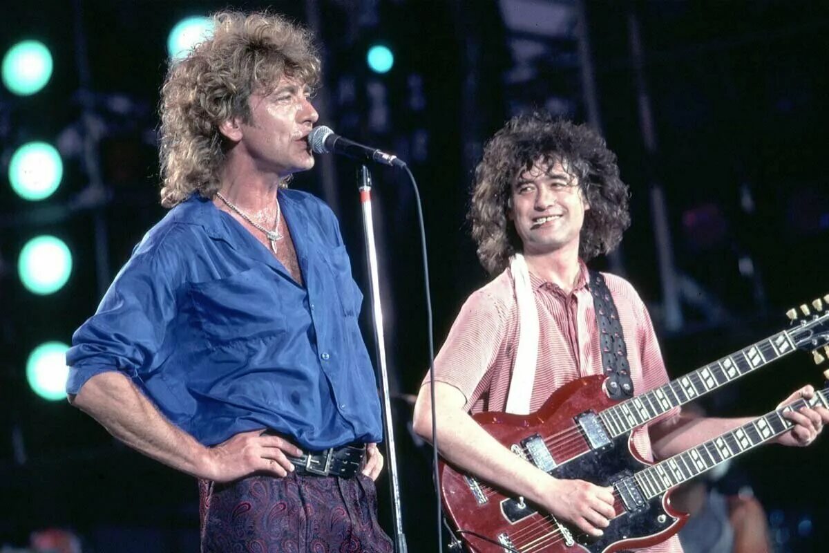 Плант групп. Led Zeppelin 1985. Led Zeppelin Live Aid 1985. Концерт группы лед Зеппелин.