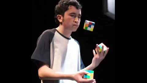 A 19-year-old Colombian boy smashed his own world record by juggling three Rubik...
