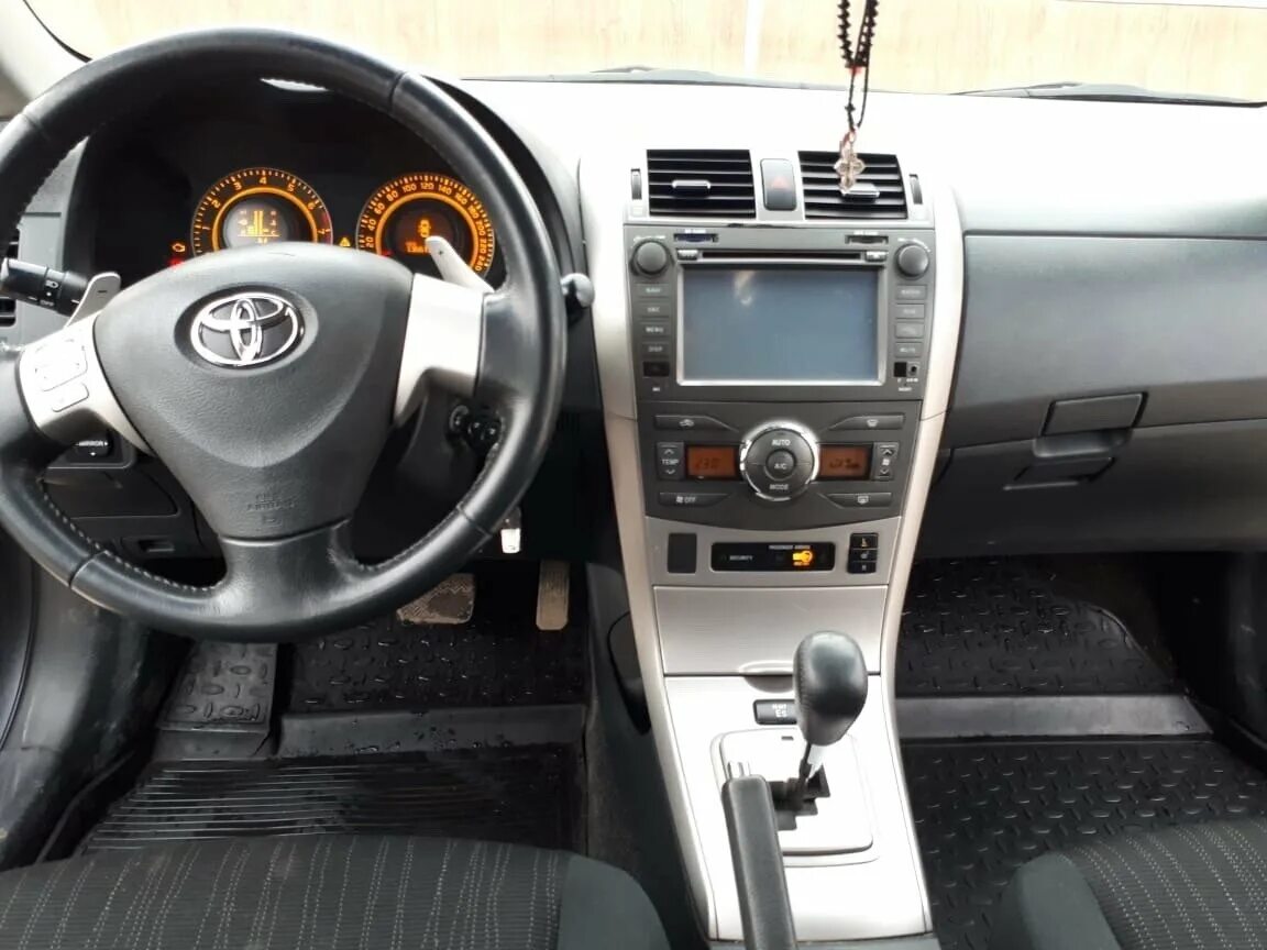 Toyota Corolla 2008 салон. Тойота Королла 2008 внутри. Тайота Карола 2008 внутри. Тойота Королла 2008 Люкс. Полная комплектация что входит