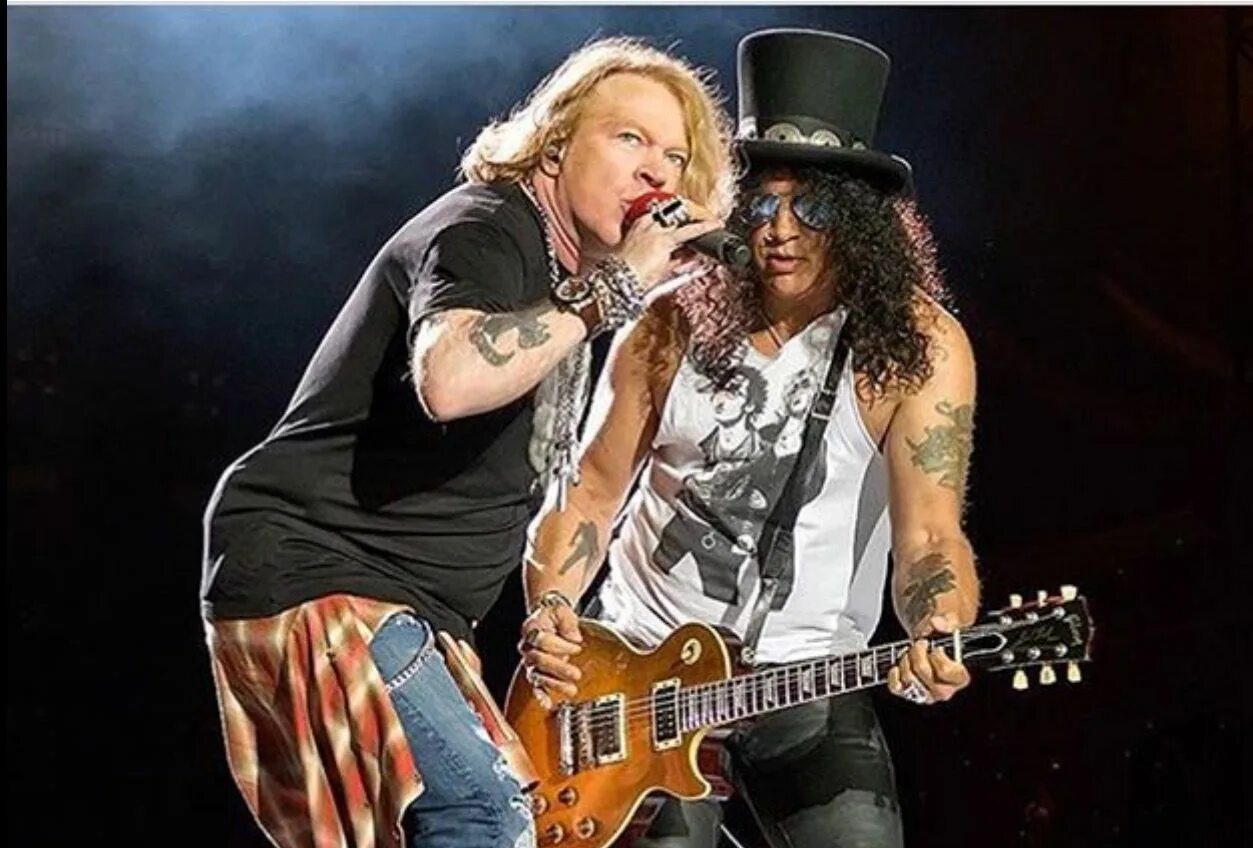 Ганзен роузес клипы. Эксл Роуз. Axl Rose and Slash. Эксл Роуз и слэш. Группа Guns n' Roses Slash.