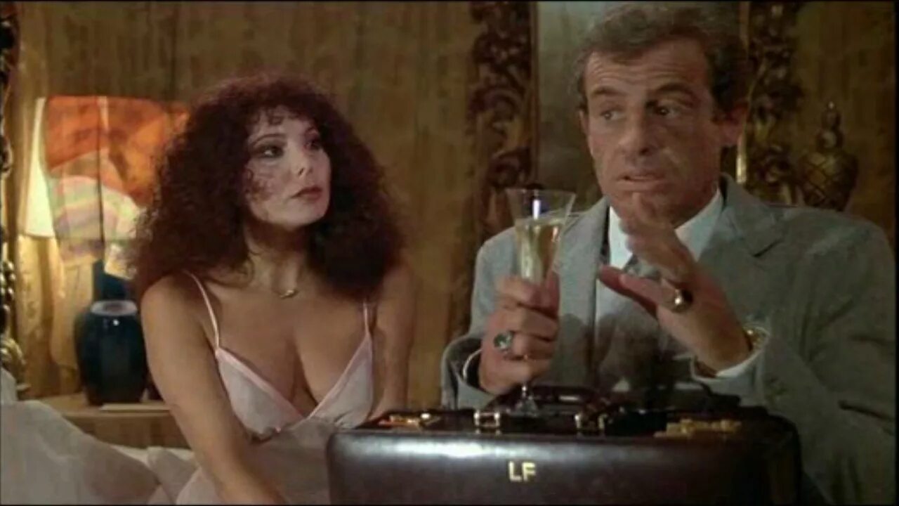 Игра в четыре руки фильм. Жан-поль бельмондо игра в четыре руки. Фильм игра в четыре руки с бельмондо. Бельмондо игра в четыре руки. Фильм игра в четыре руки с бельмондо.