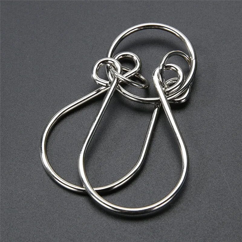 Wire puzzle. Головоломка-кольцо pentacle. металлические головоломки монтессори. головоломка металлическая brain puzzles. головоломка металлическая с кольцами.