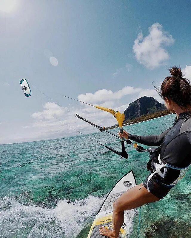 Complete the exchanges he is on windsurfing